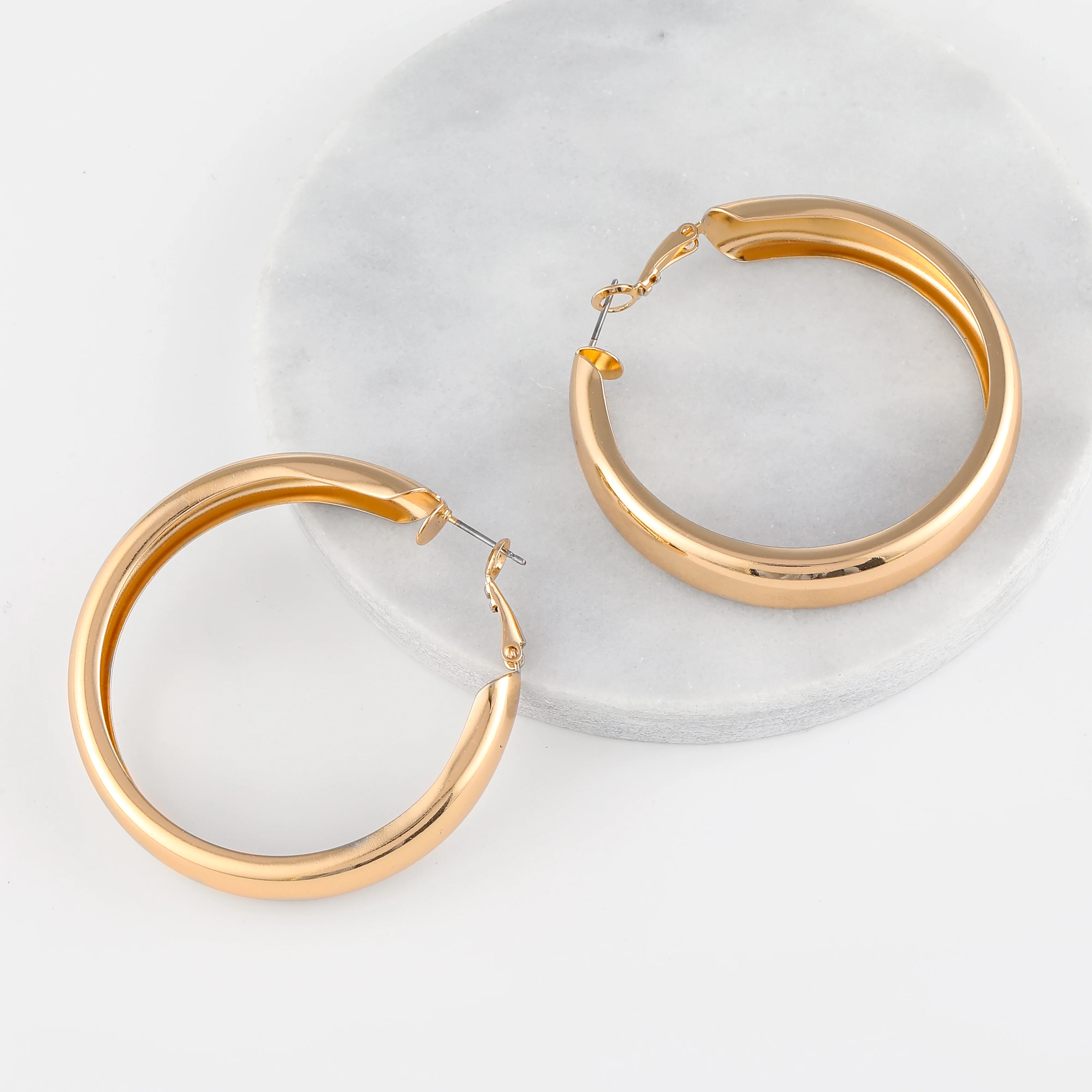 Chunky Hollow Hoop Earrings - Image 4